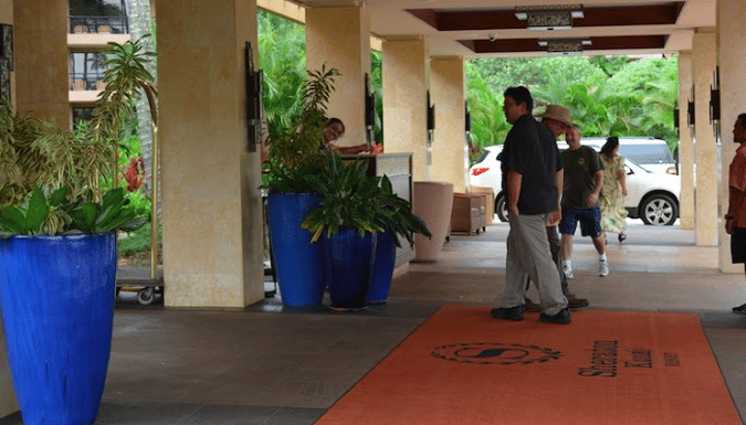 large, colorful, seasonal planters are a commercial landscape enhancement for entrances